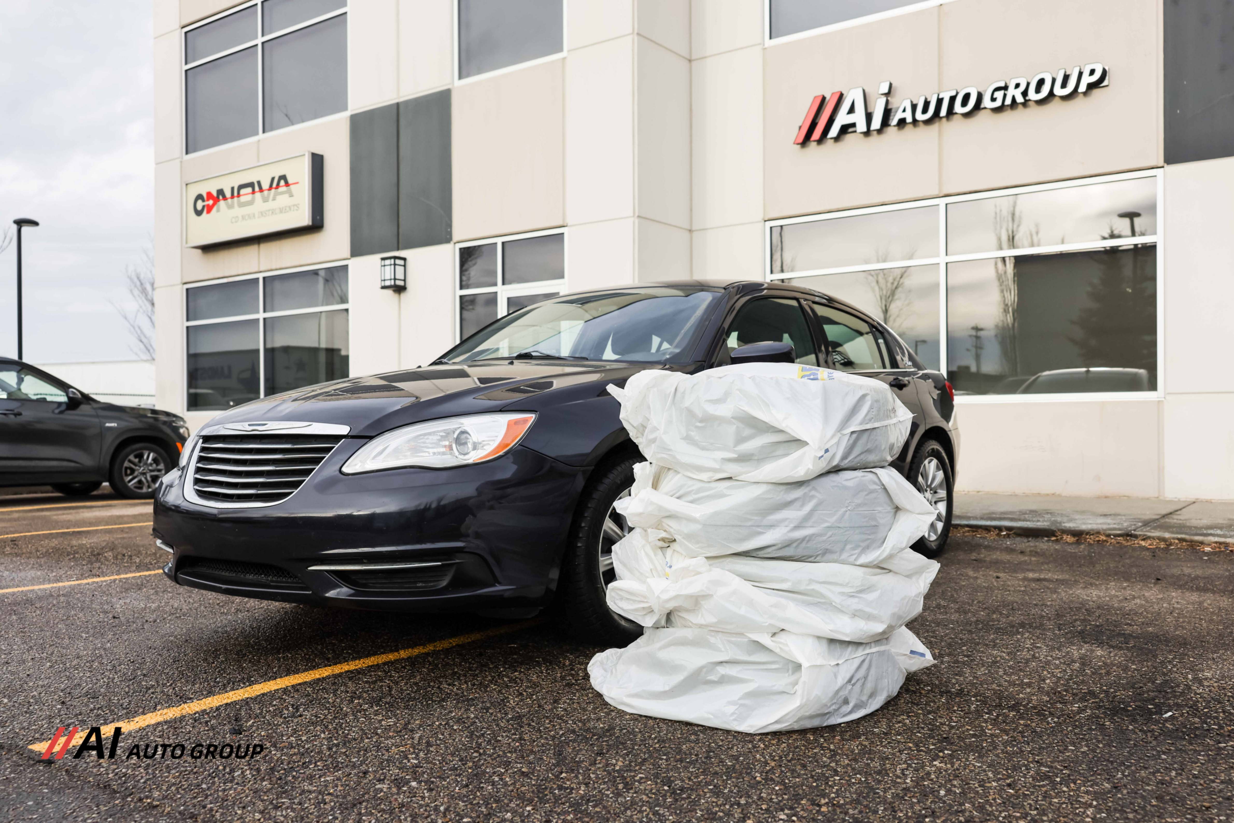 /aiautogroup/2011-Chrysler-200-0011934863393028294.jpg