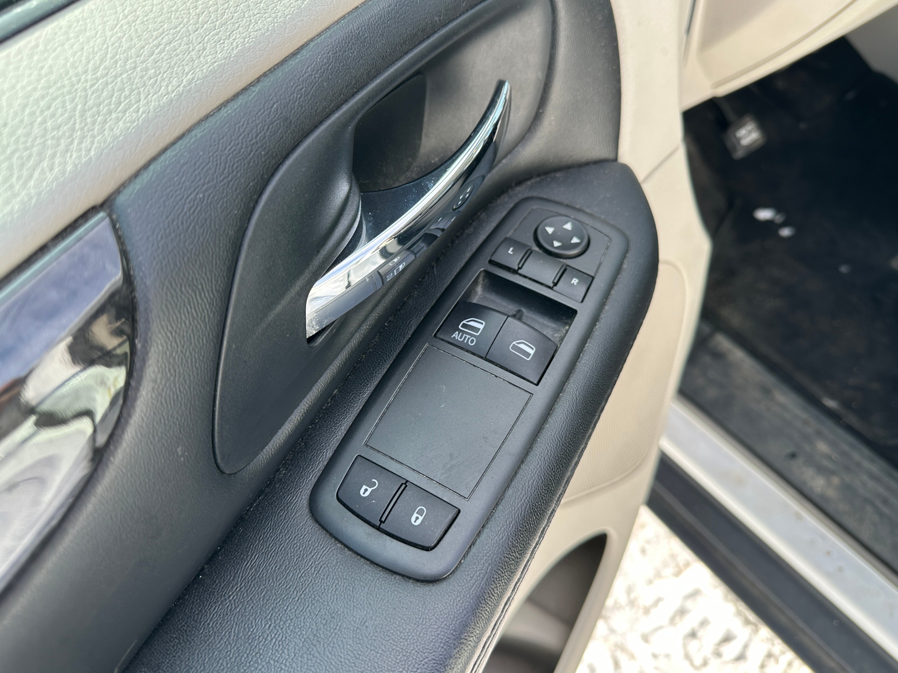 /aiautogroup/2015-Dodge-GrandCaravan-29141821705461446.jpg
