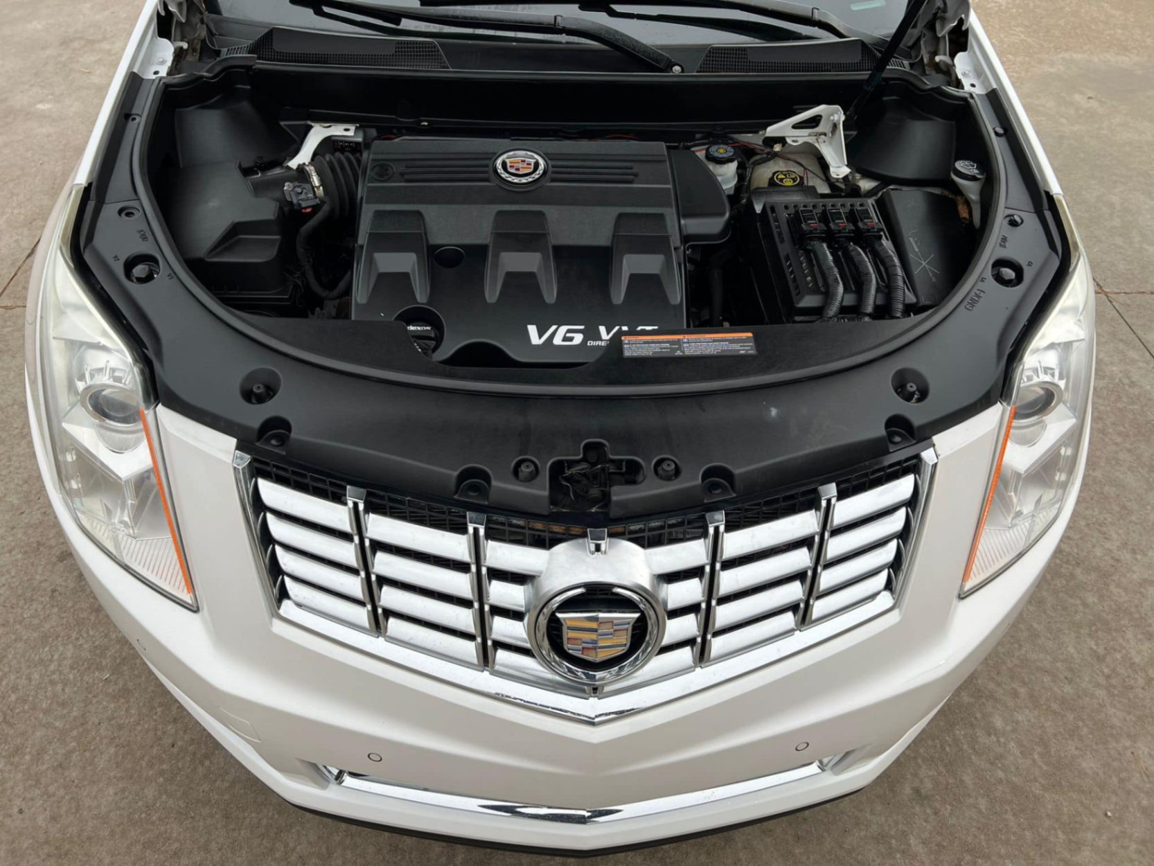 /akmautomotiveltd/2013-Cadillac-SRX-6881447203472246.jpg