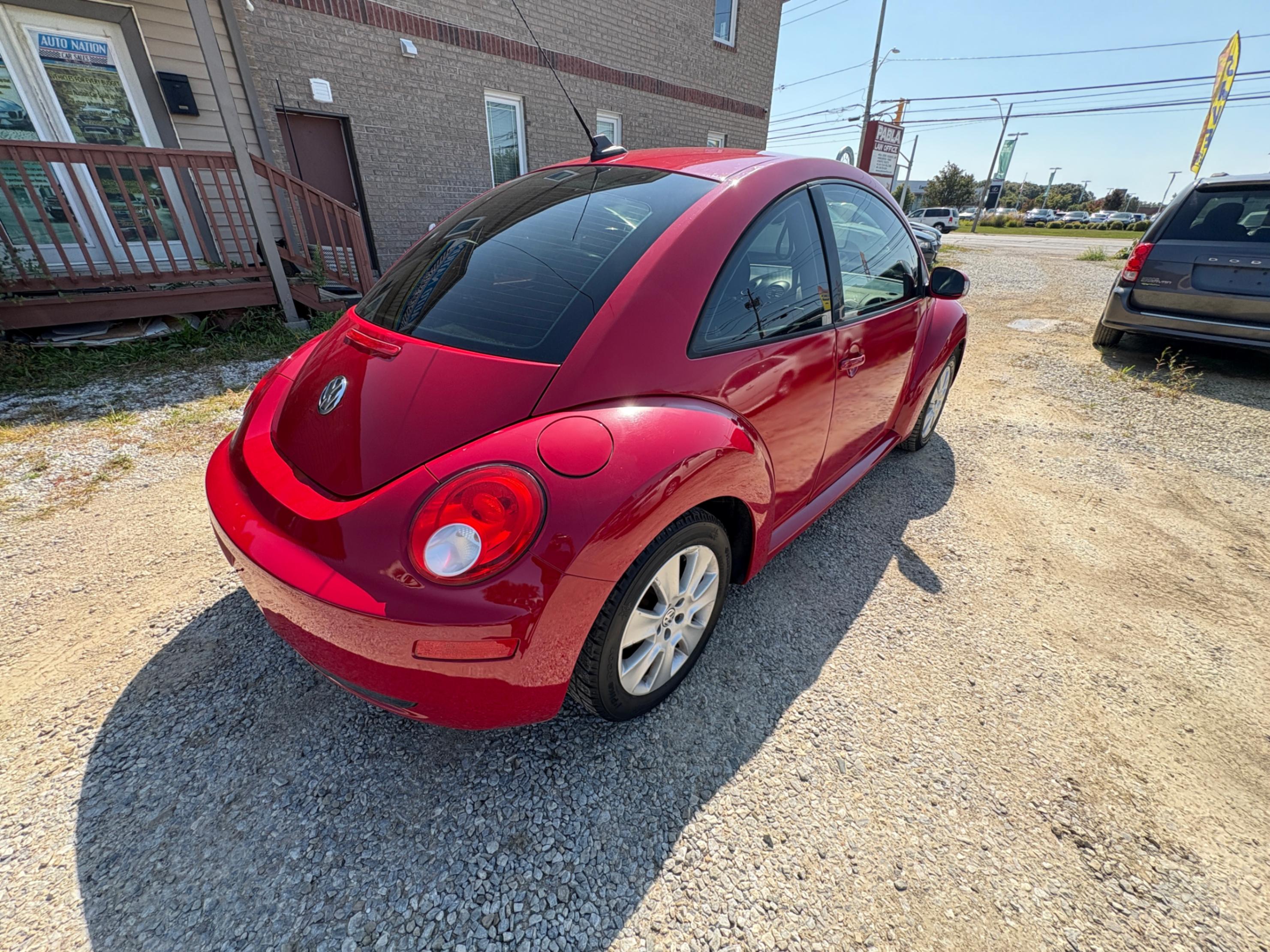 /autonationcarsales/2010-Volkswagen-NewBeetle-27589231437350636.jpg