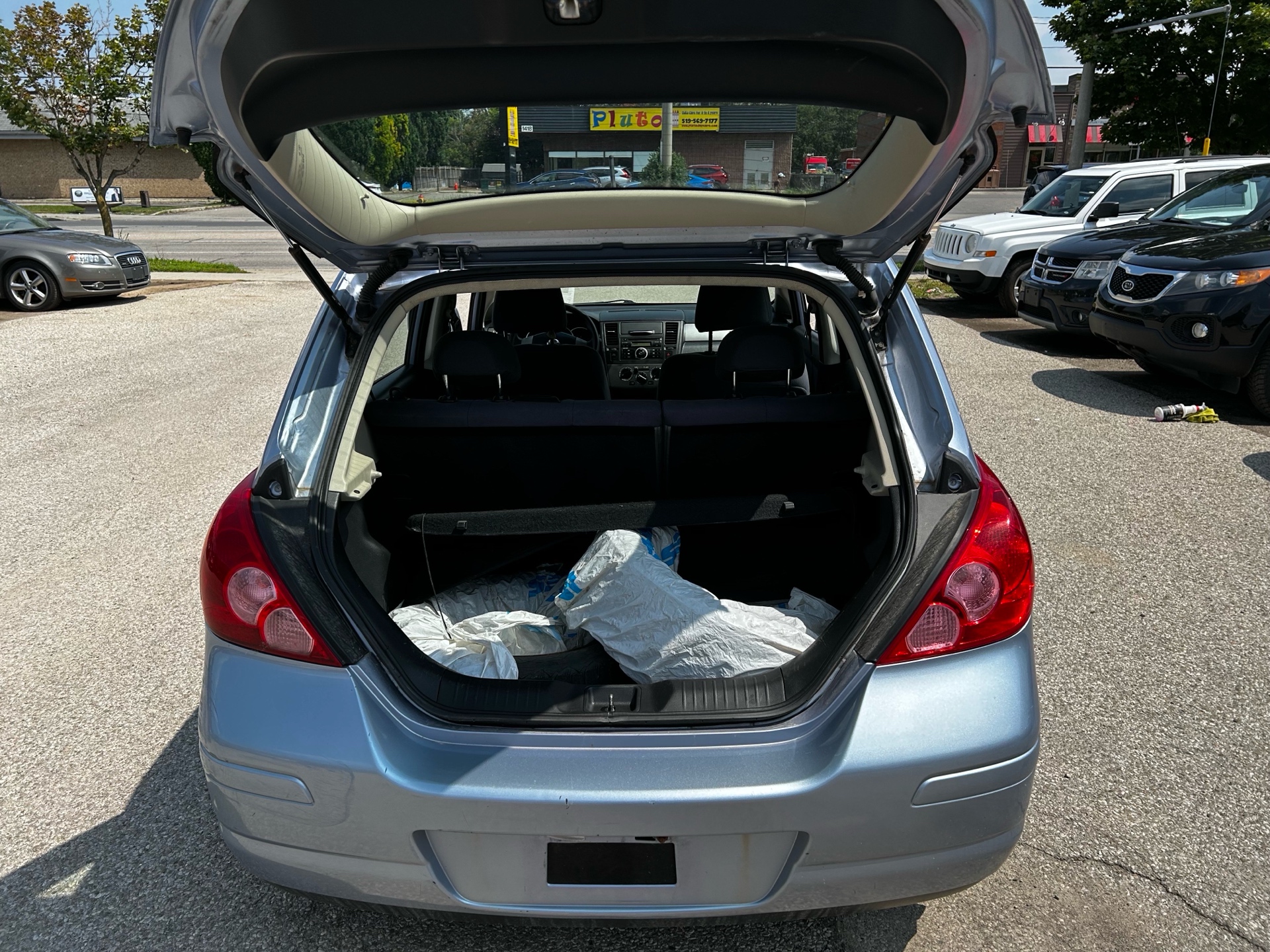 /betaautosales/2009-Nissan-Versa-708634265834293.jpg
