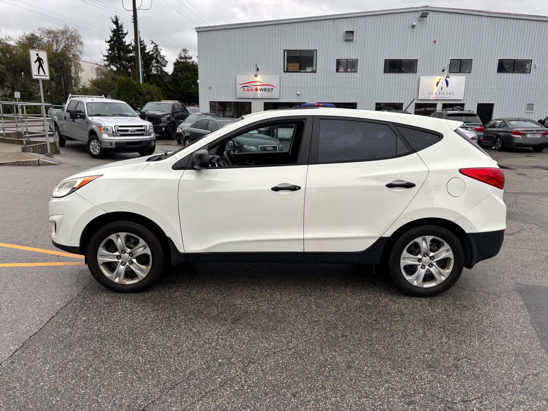 /canwestautoinc/2012-Hyundai-Tucson-33694803333572887.jpg