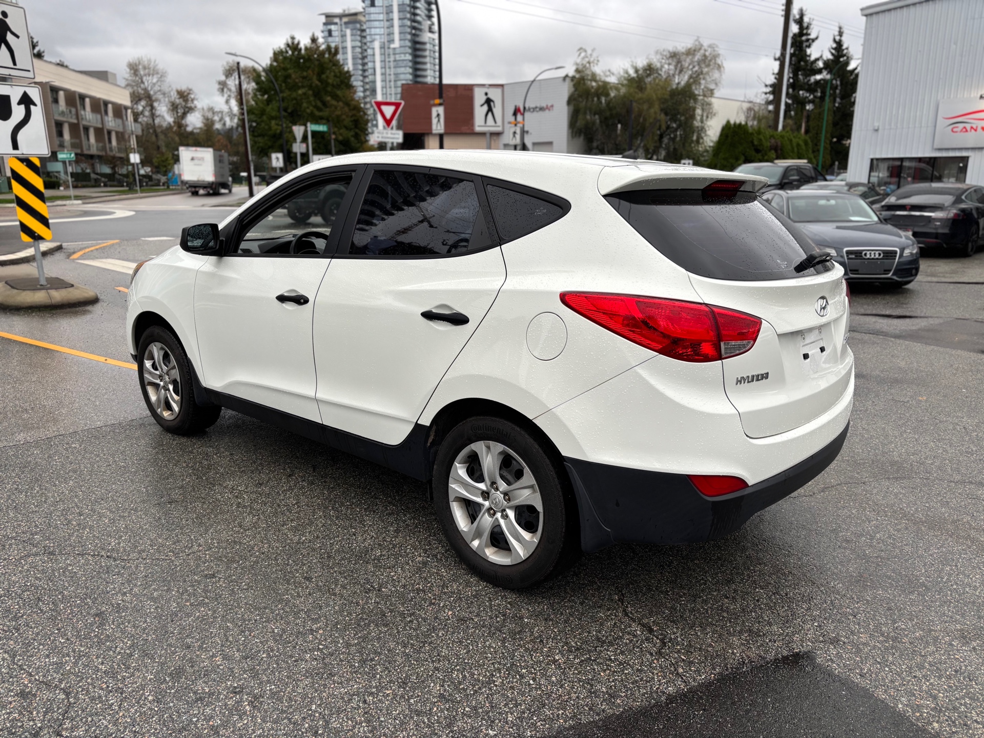 /canwestautoinc/2012-Hyundai-Tucson-7193219873523746.jpg