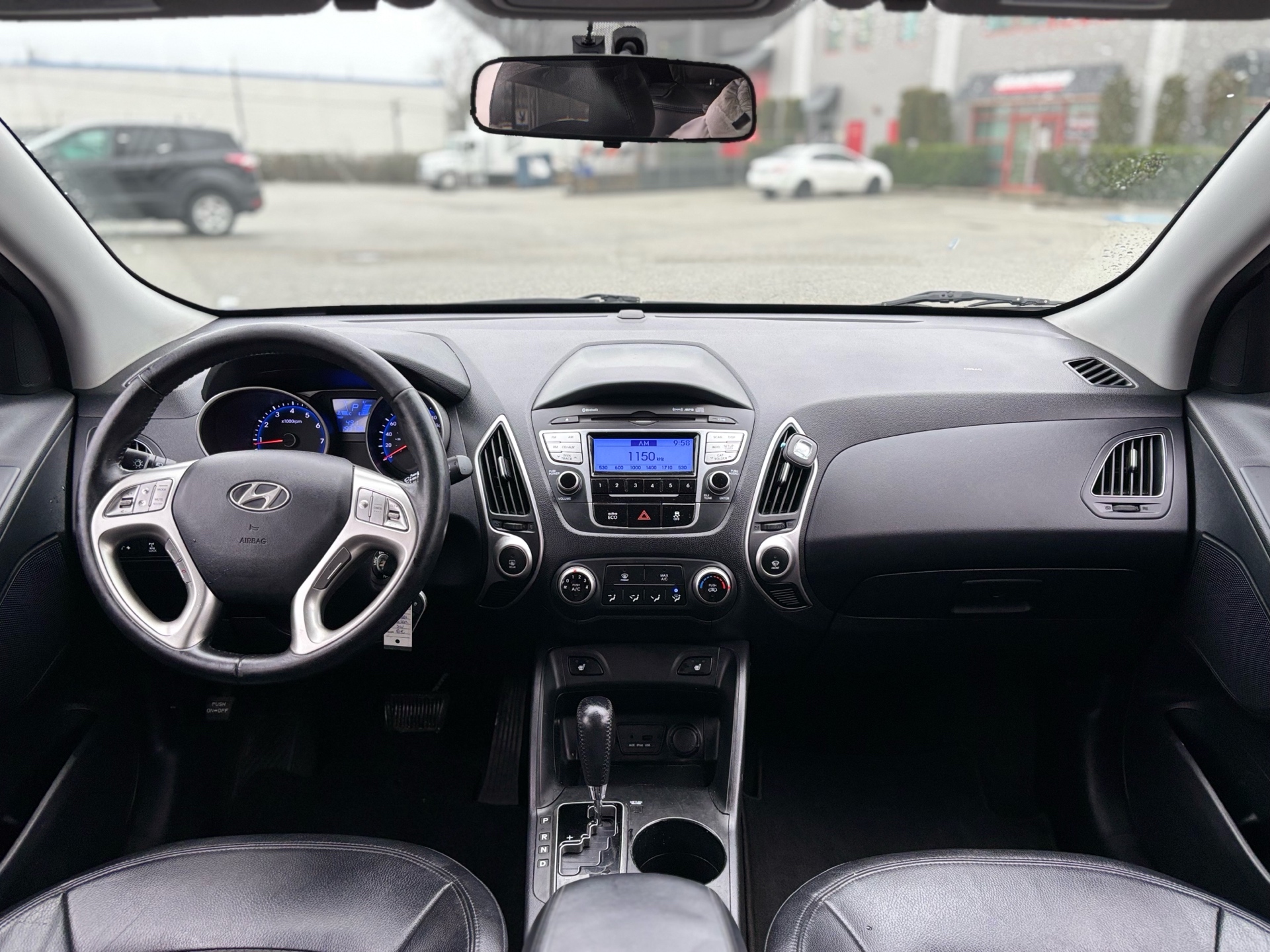 /canwestautoinc/2012-Hyundai-Tucson-8245587018402167.jpg