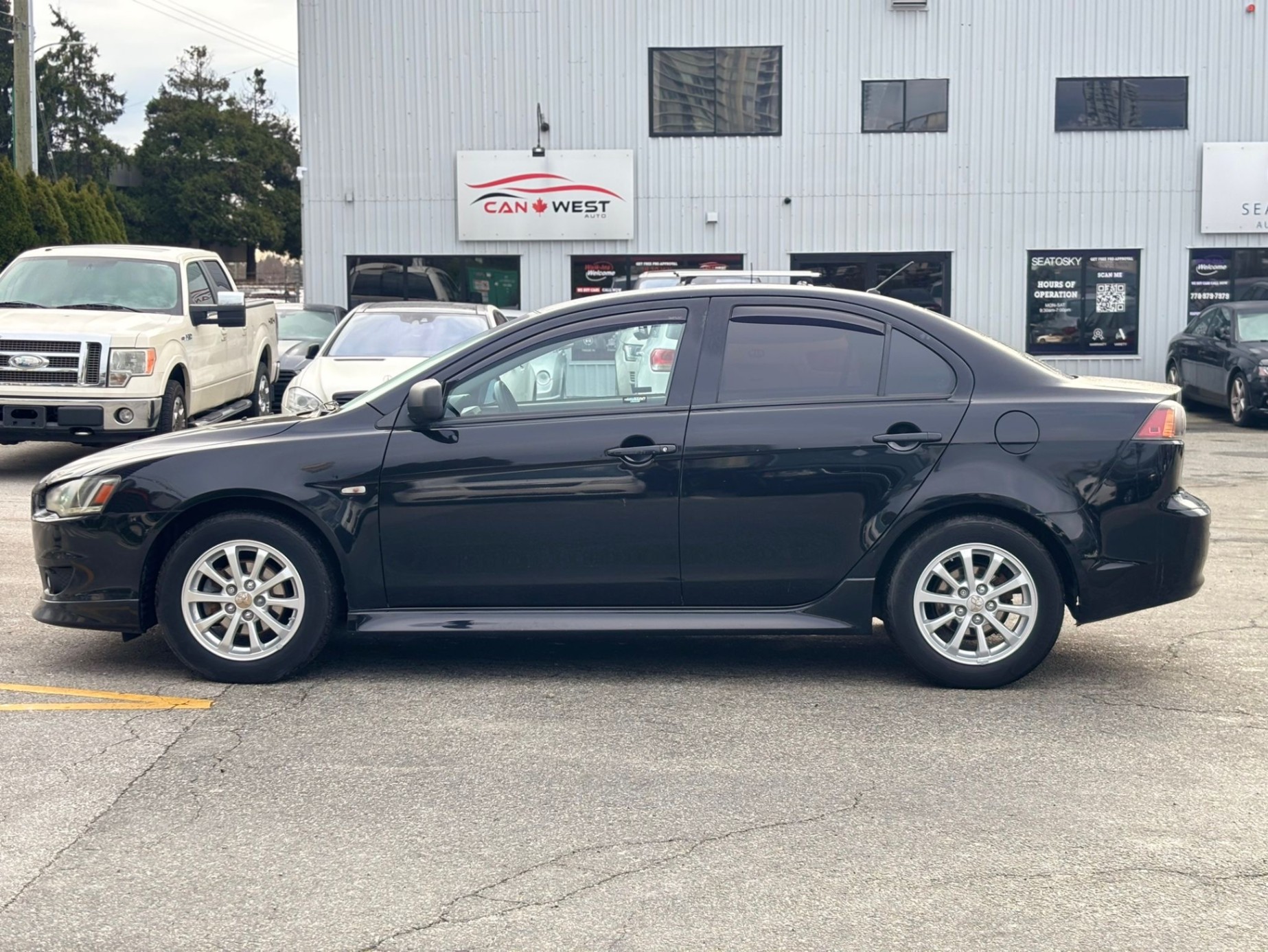 /canwestautoinc/2012-Mitsubishi-Lancer-1752760396728592.jpg