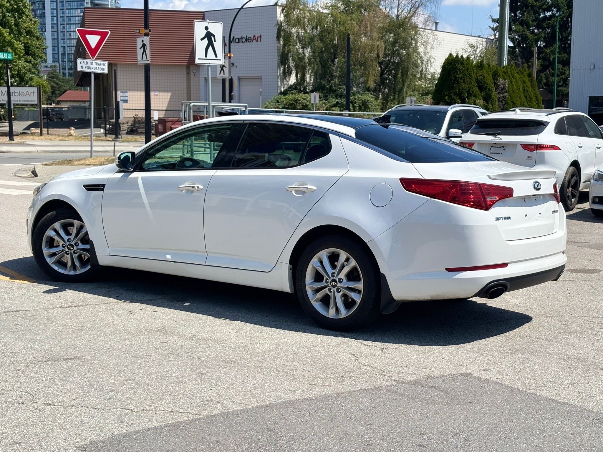 /canwestautoinc/2013-Kia-Optima-355316487187352.jpg
