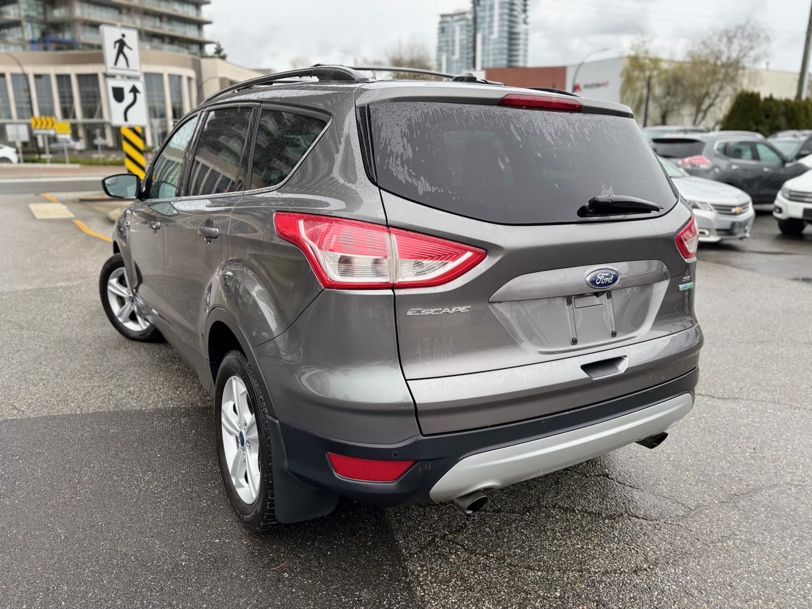 /canwestautoinc/2014-Ford-Escape-25045468318139164.jpg
