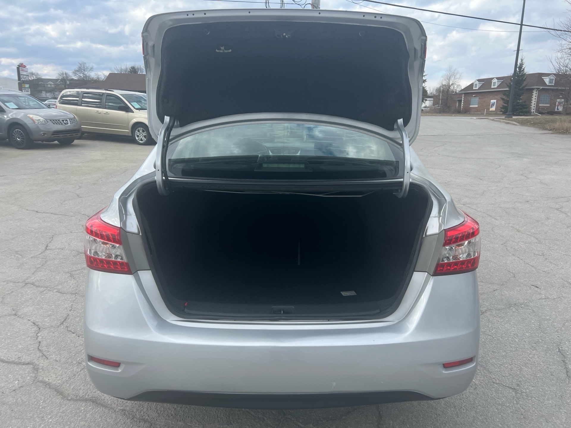 /carage/2013-Nissan-Sentra-55875378123149.jpg