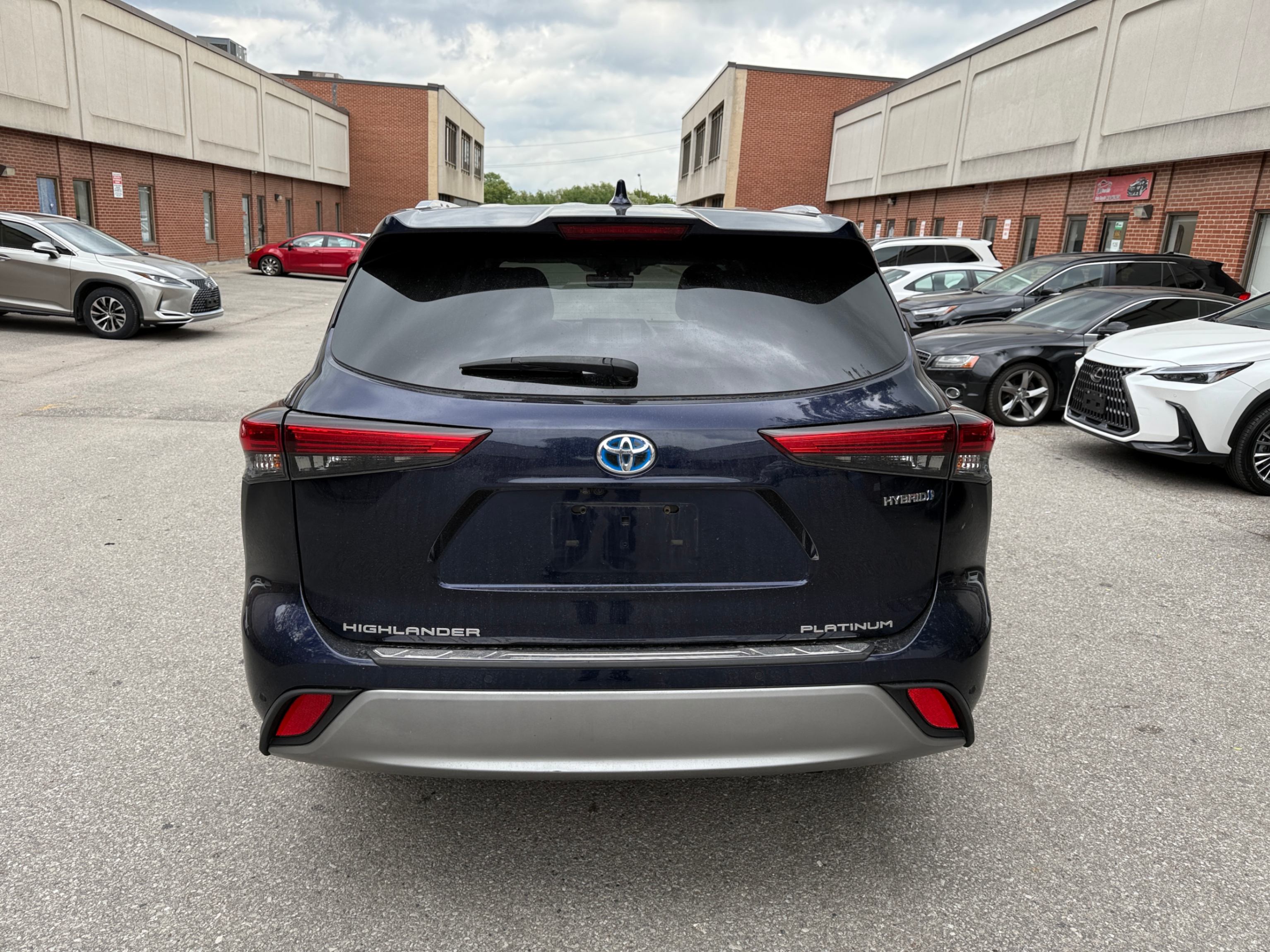 /crownautomobile/2021-Toyota-Highlander-1858879527122086.jpg