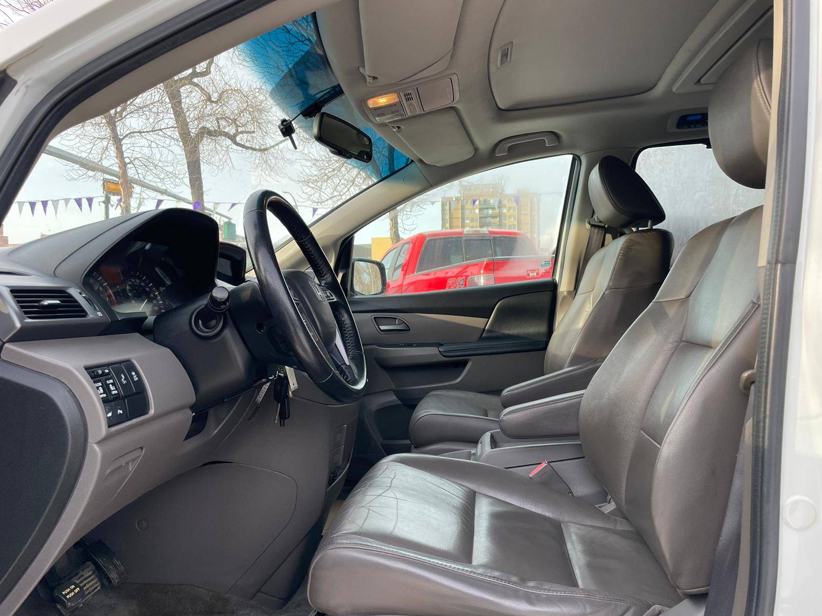 /drivenbyyouautosales/2012-Honda-Odyssey-26022796140285753.jpg