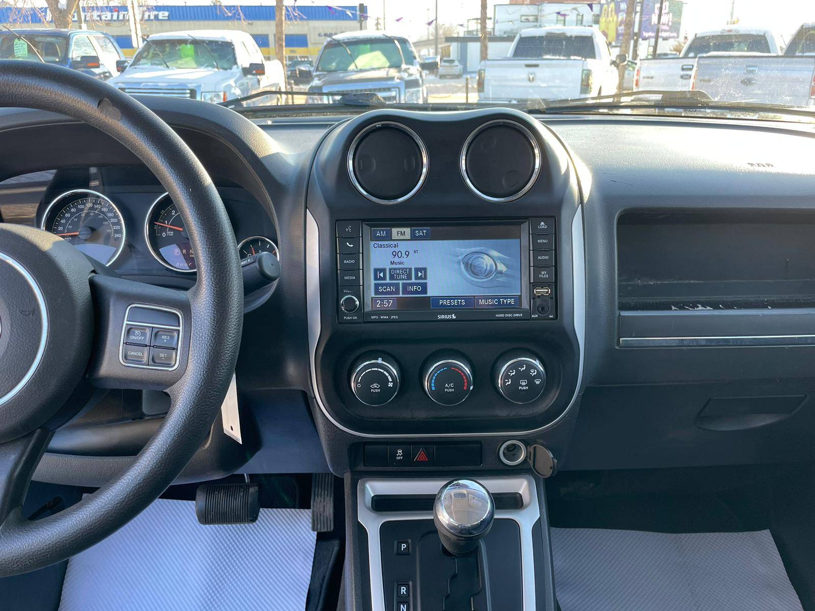 /drivenbyyouautosales/2014-Jeep-Compass-4908829862923696.jpg
