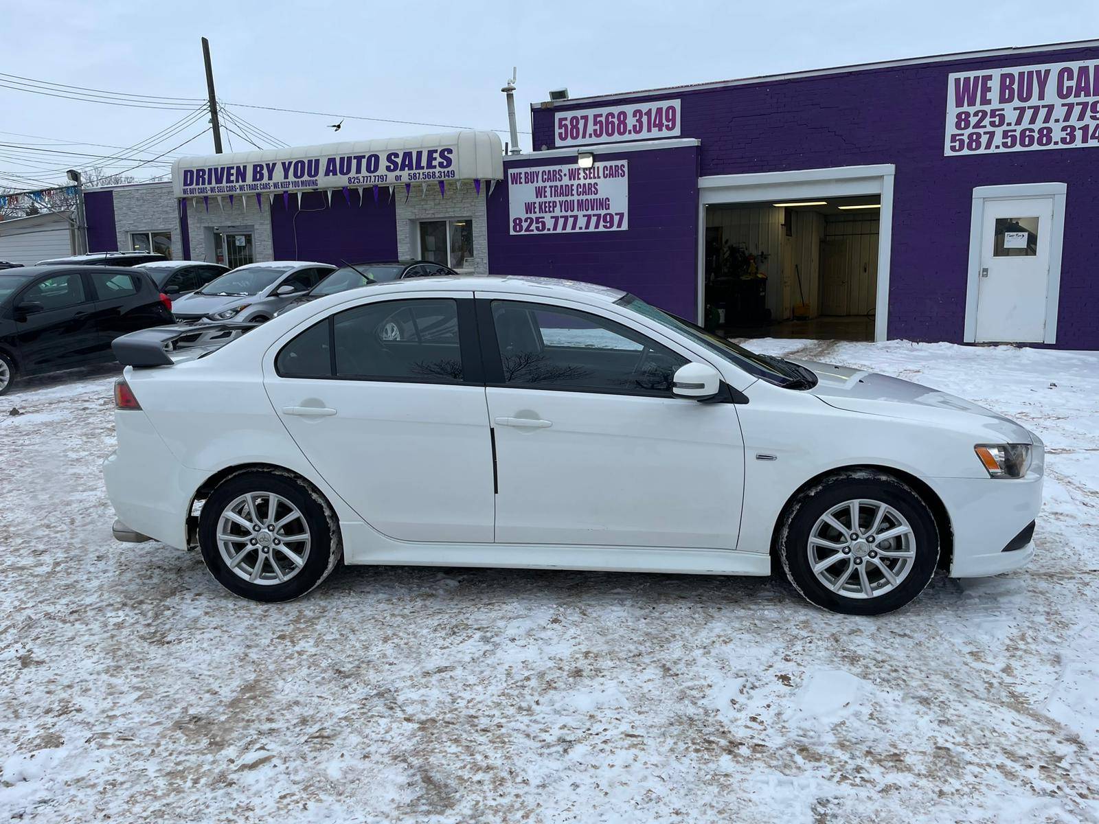 /drivenbyyouautosales/2015-Mitsubishi-Lancer-7525023005638394.jpg