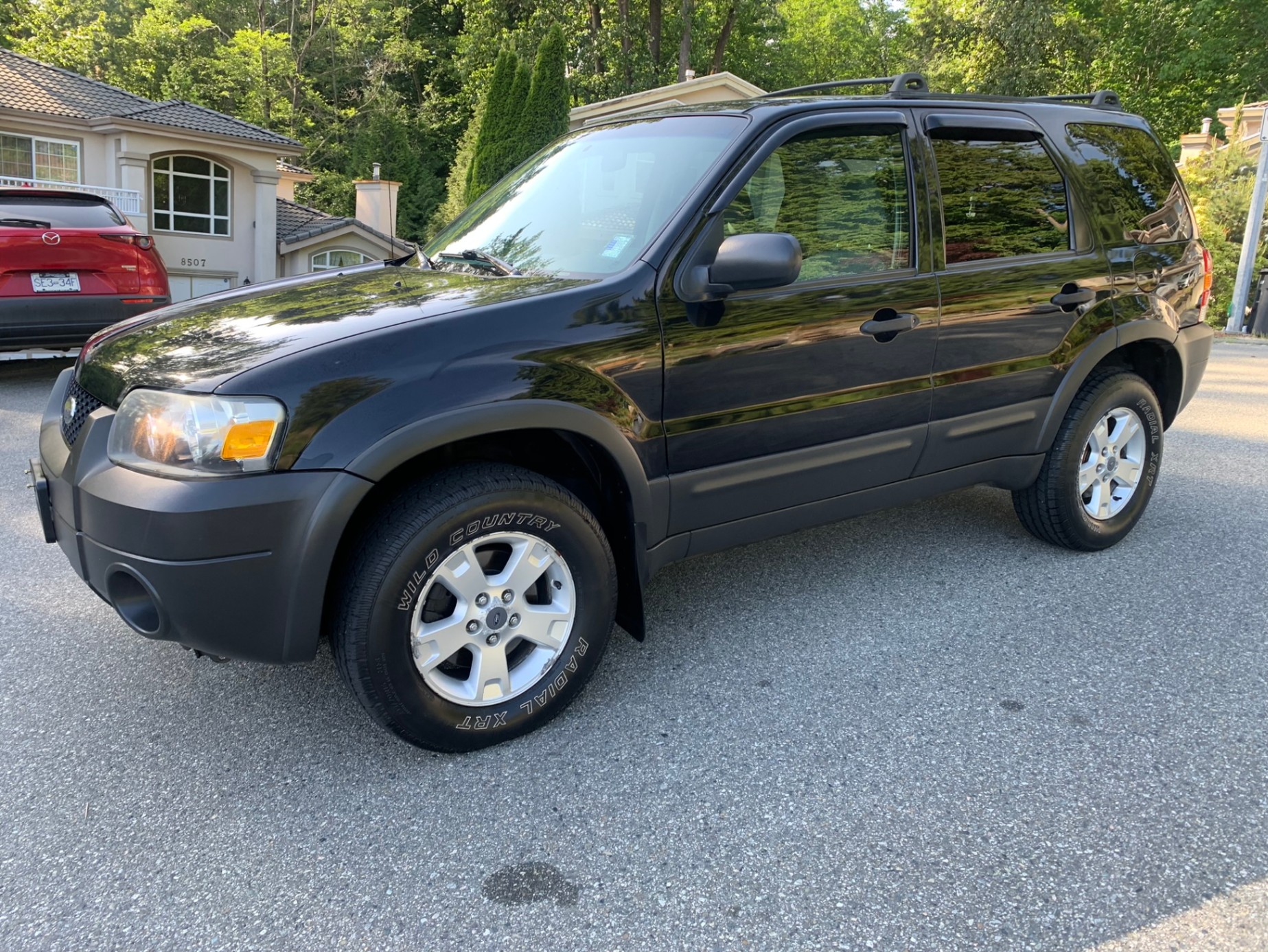 /enixmotorsportltd/2006-Ford-Escape-7323296258241958.jpg