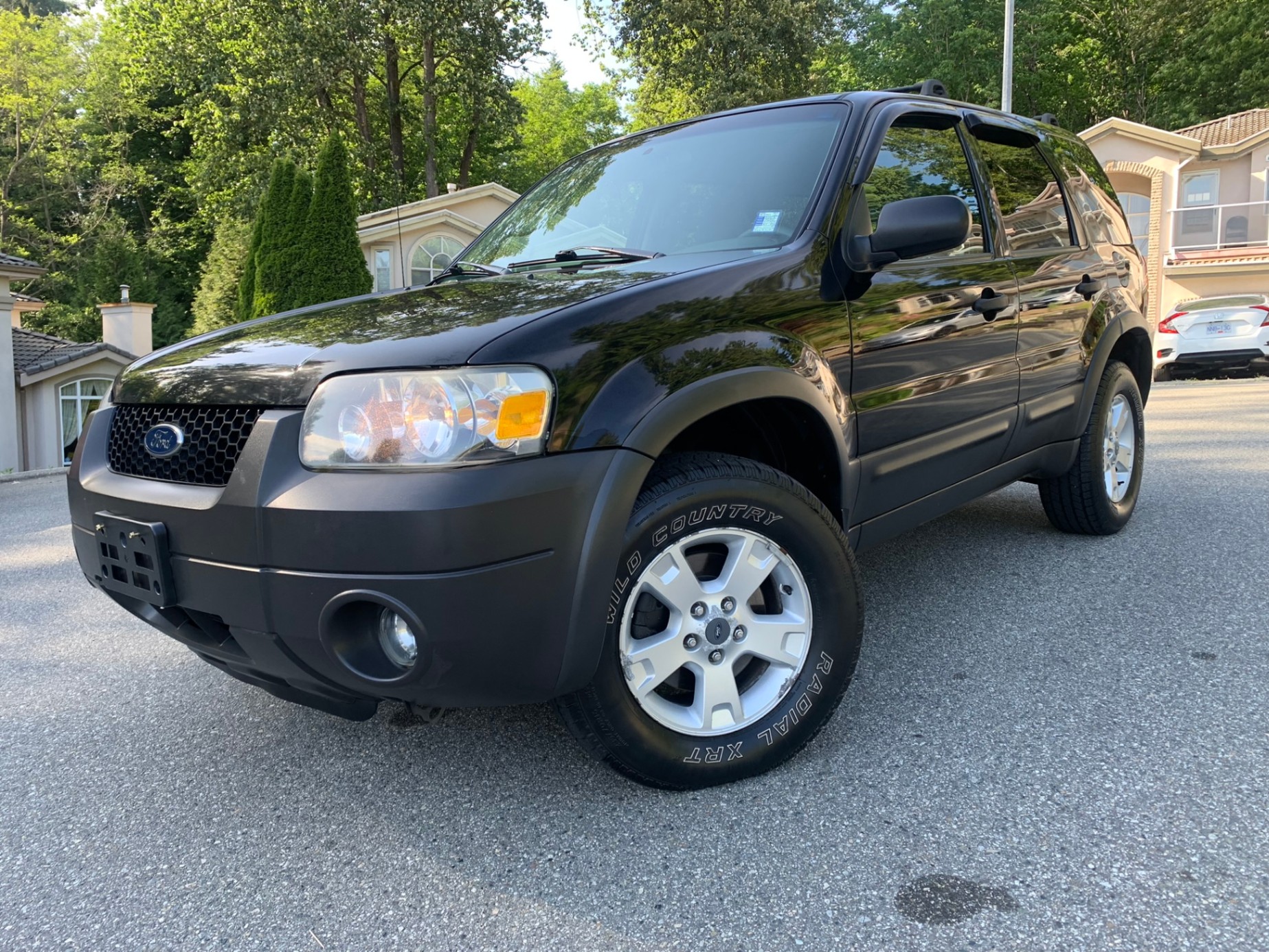 /enixmotorsportltd/2006-Ford-Escape-8804209287222482.jpg