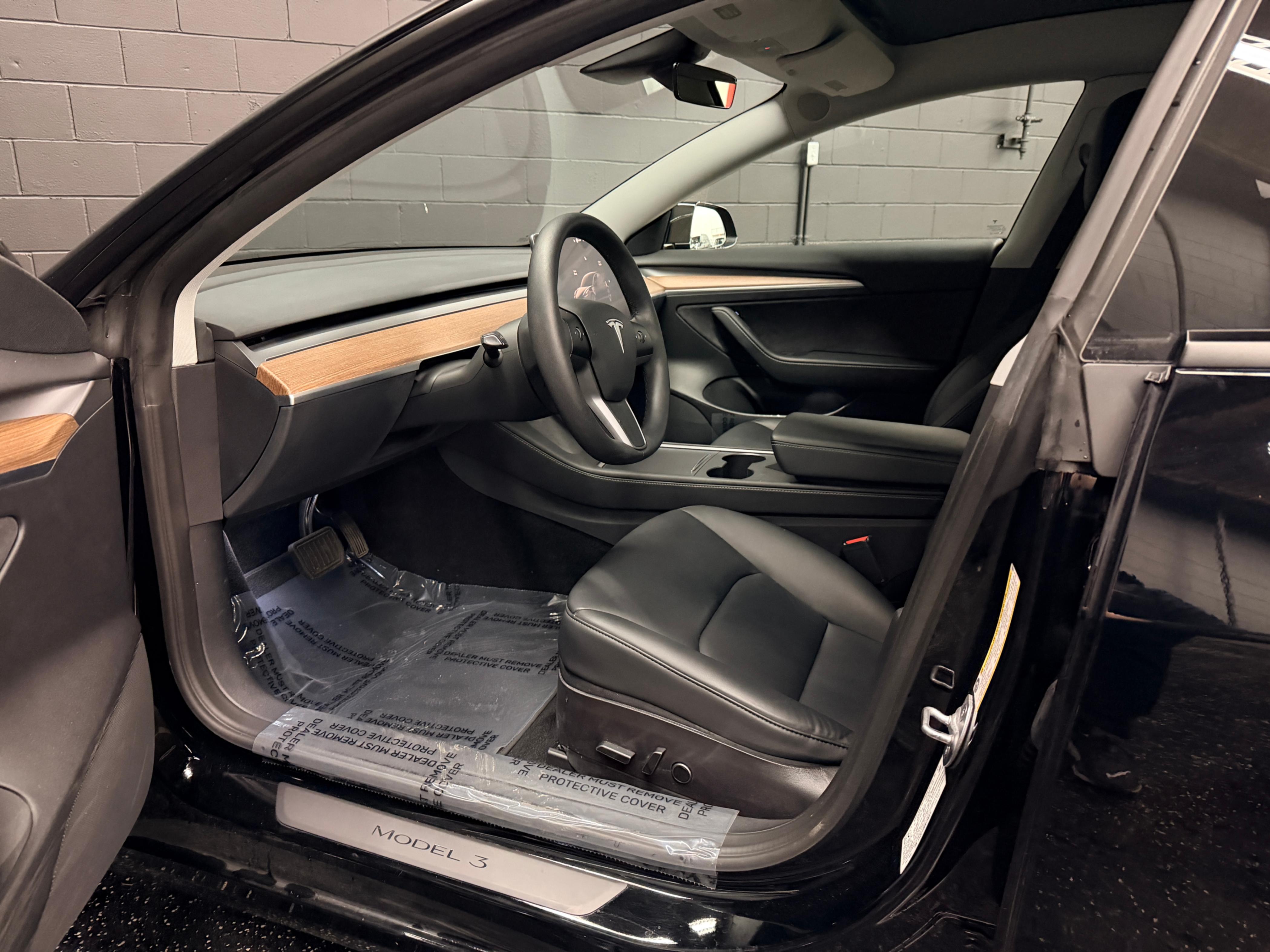 /hcwenterprisecorporation/2022-Tesla-Model3-039152210515180697.jpg