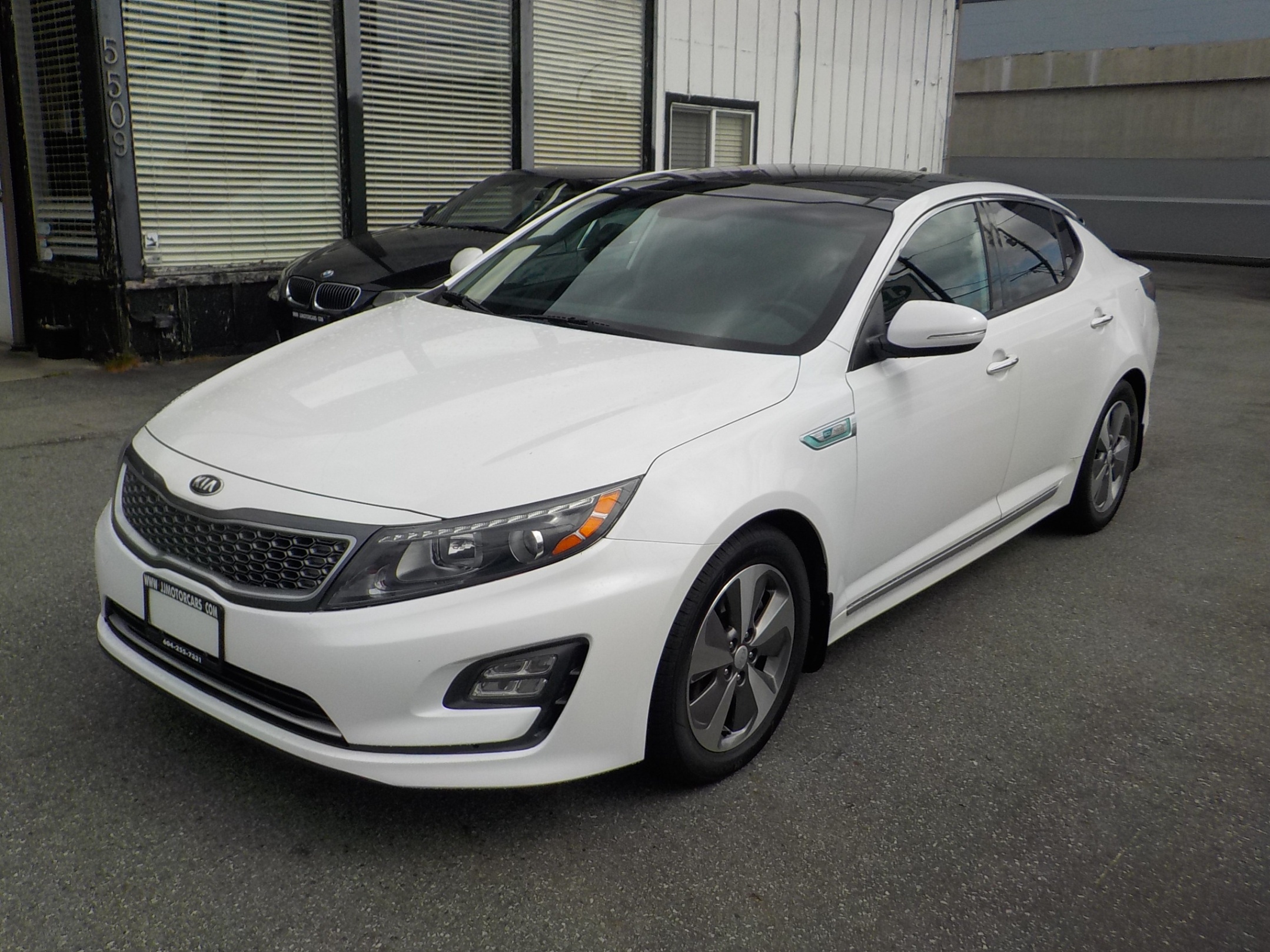 Voxcar KIA Optima Hybrid SEDAN in White, VANCOUVER