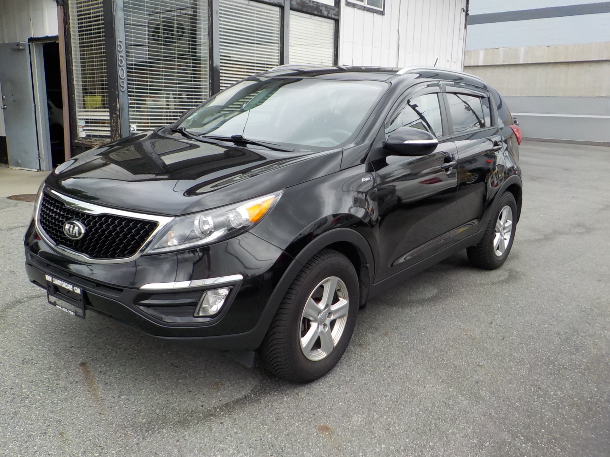 Voxcar KIA Sportage SUV in Black, VANCOUVER