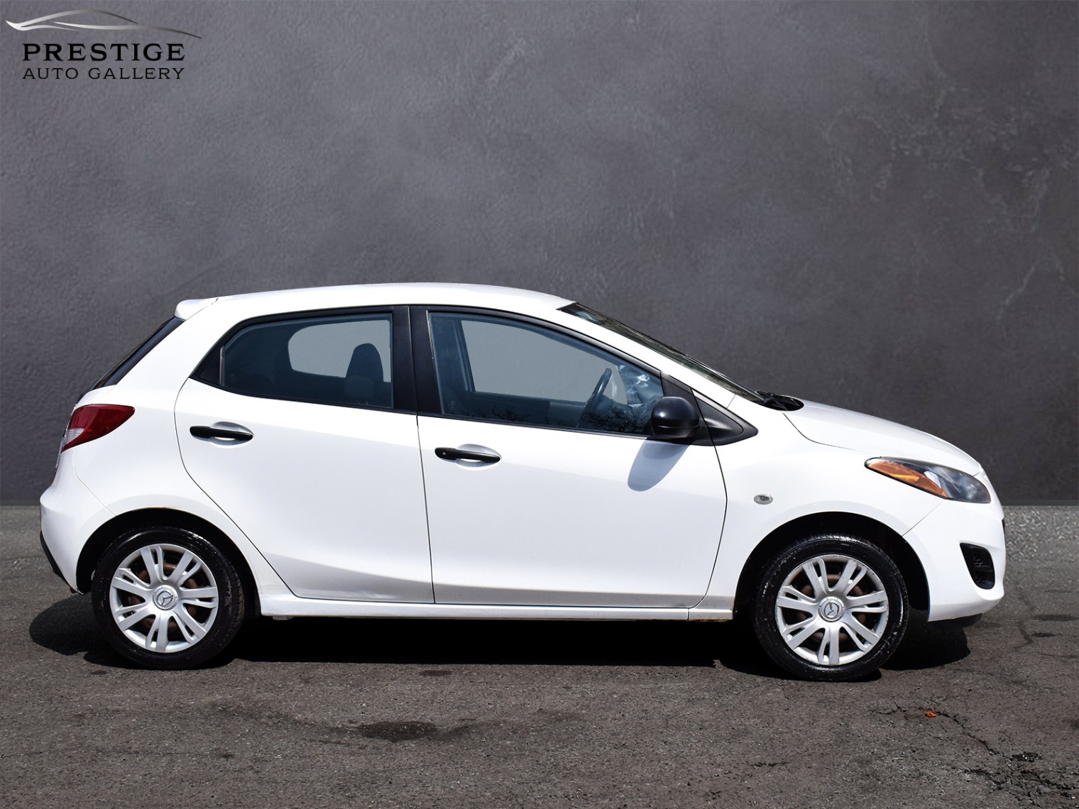 /prestigeautogallery/2012-Mazda-Mazda2-7370474612779165.jpg