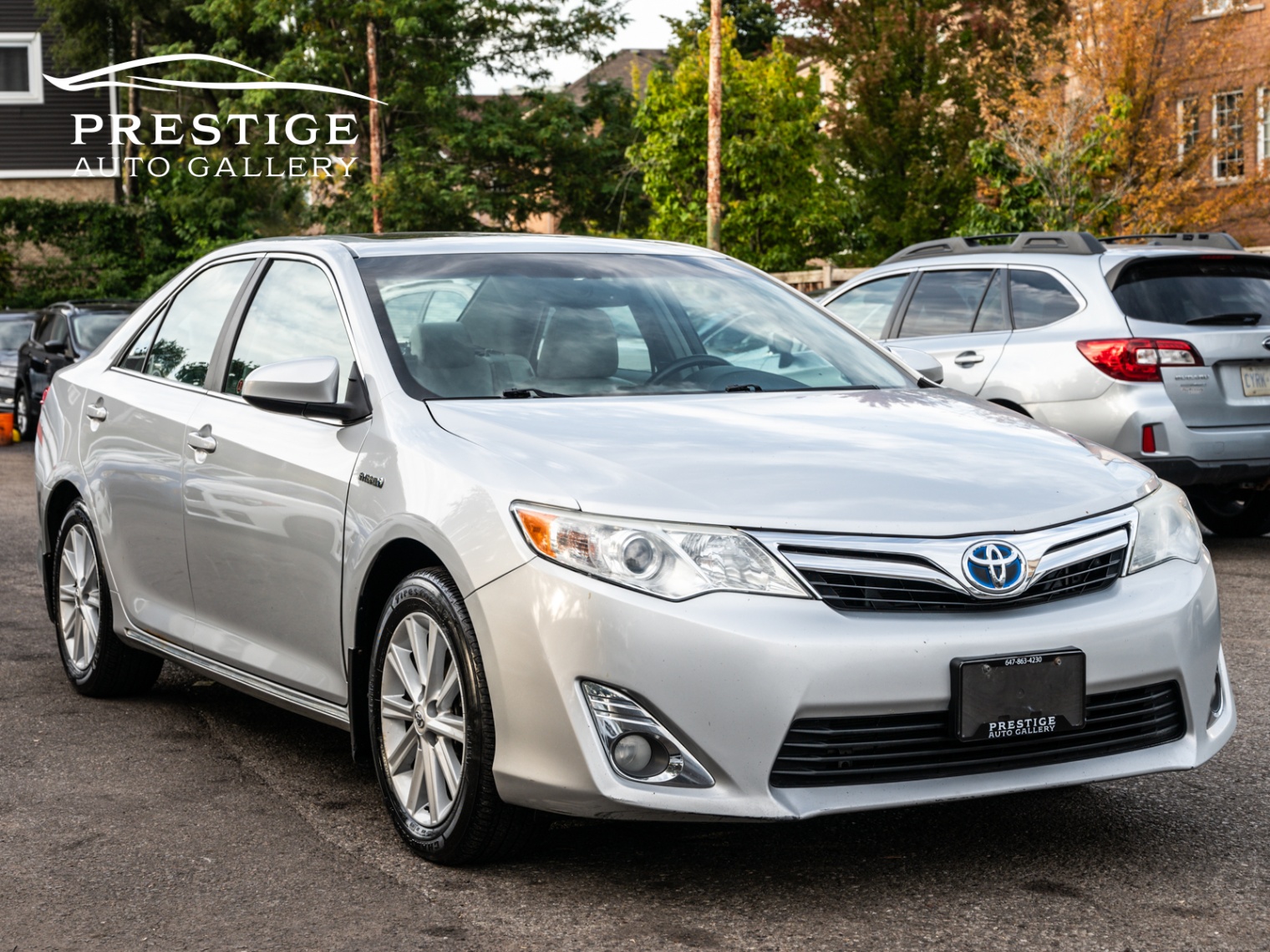 /prestigeautogallery/2012-Toyota-CamryHybrid-3825898337308291.jpg