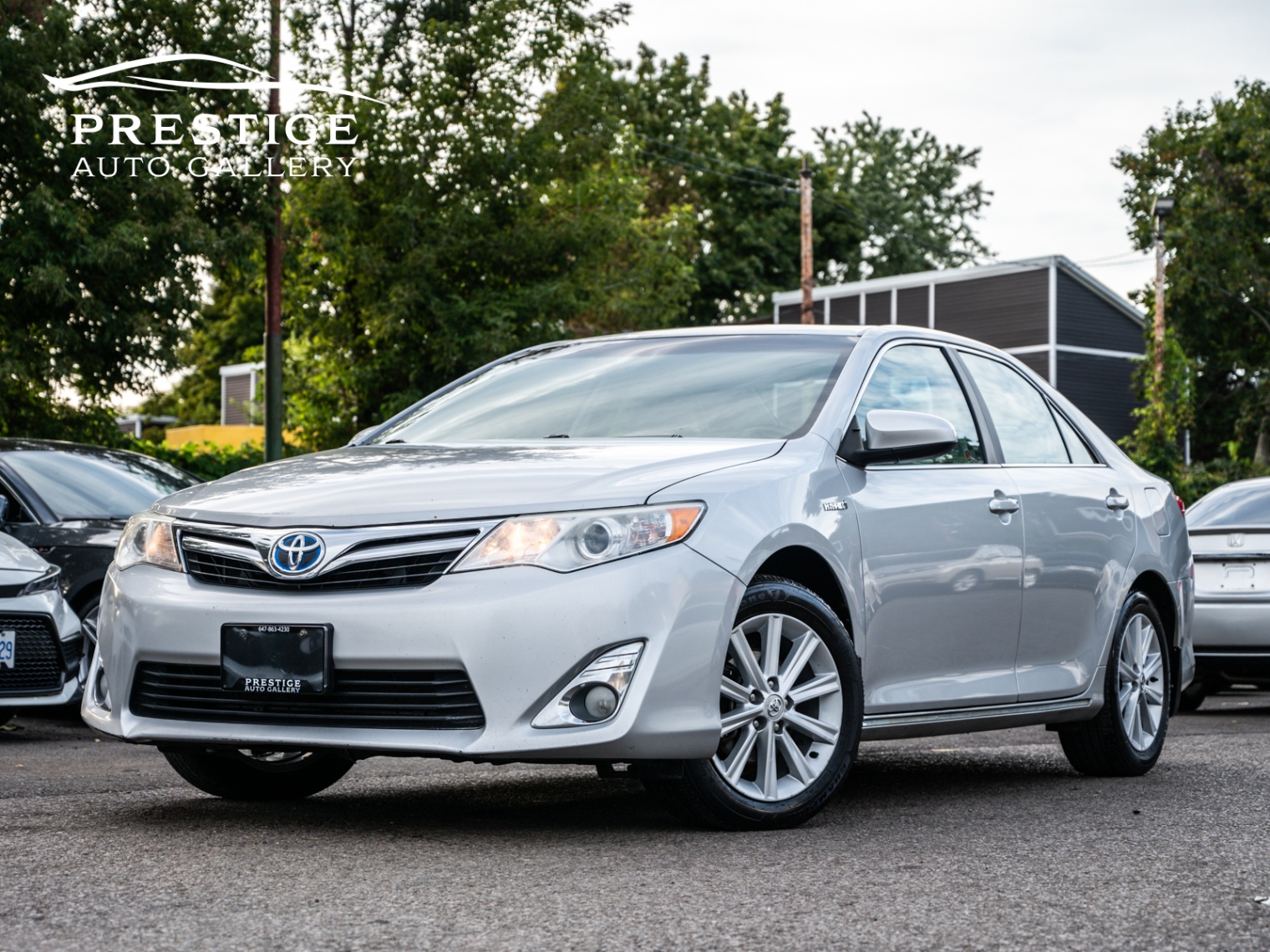 /prestigeautogallery/2012-Toyota-CamryHybrid-40173345844470143.jpg