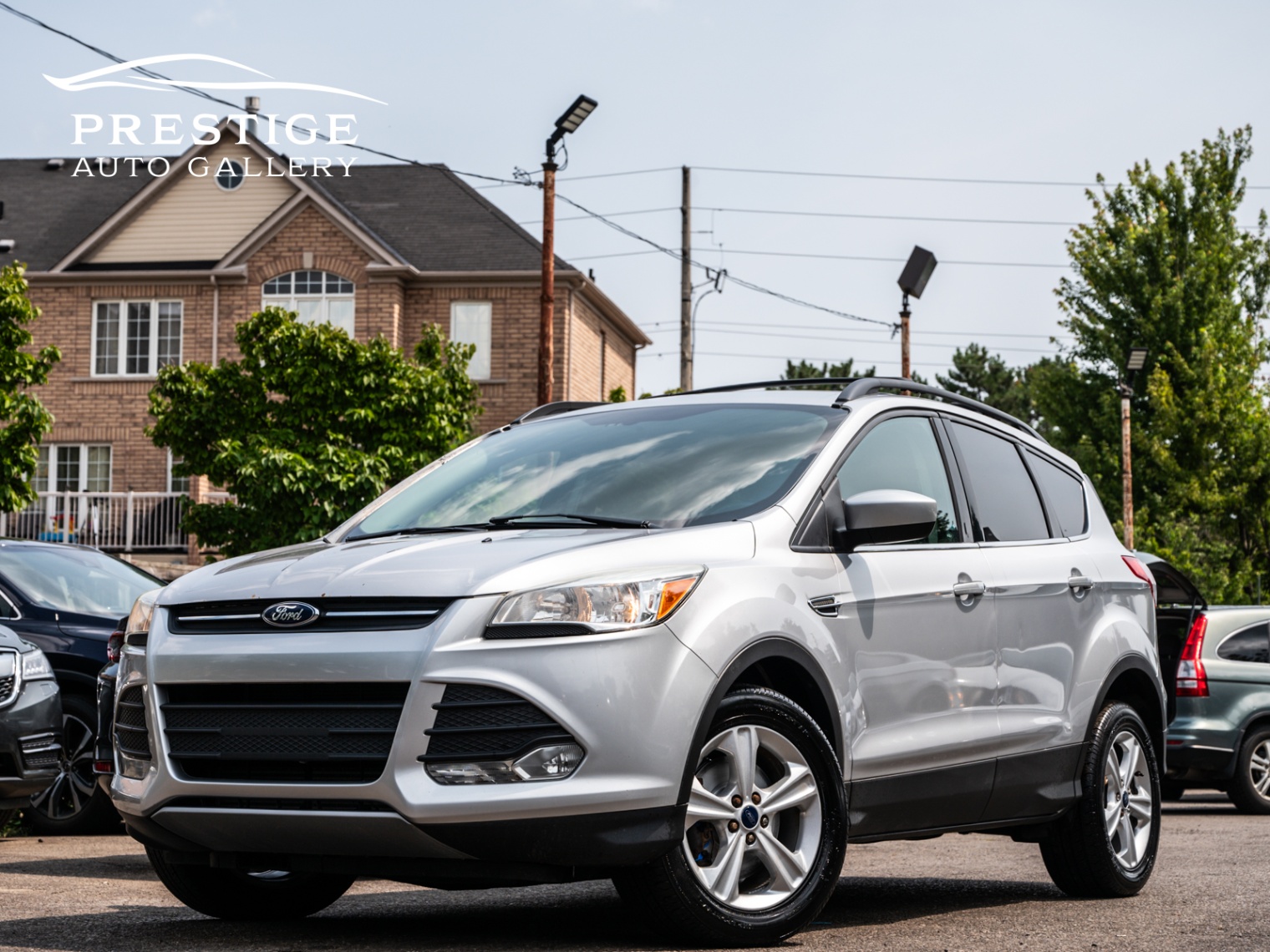 /prestigeautogallery/2014-Ford-Escape-43581470481675977.jpg