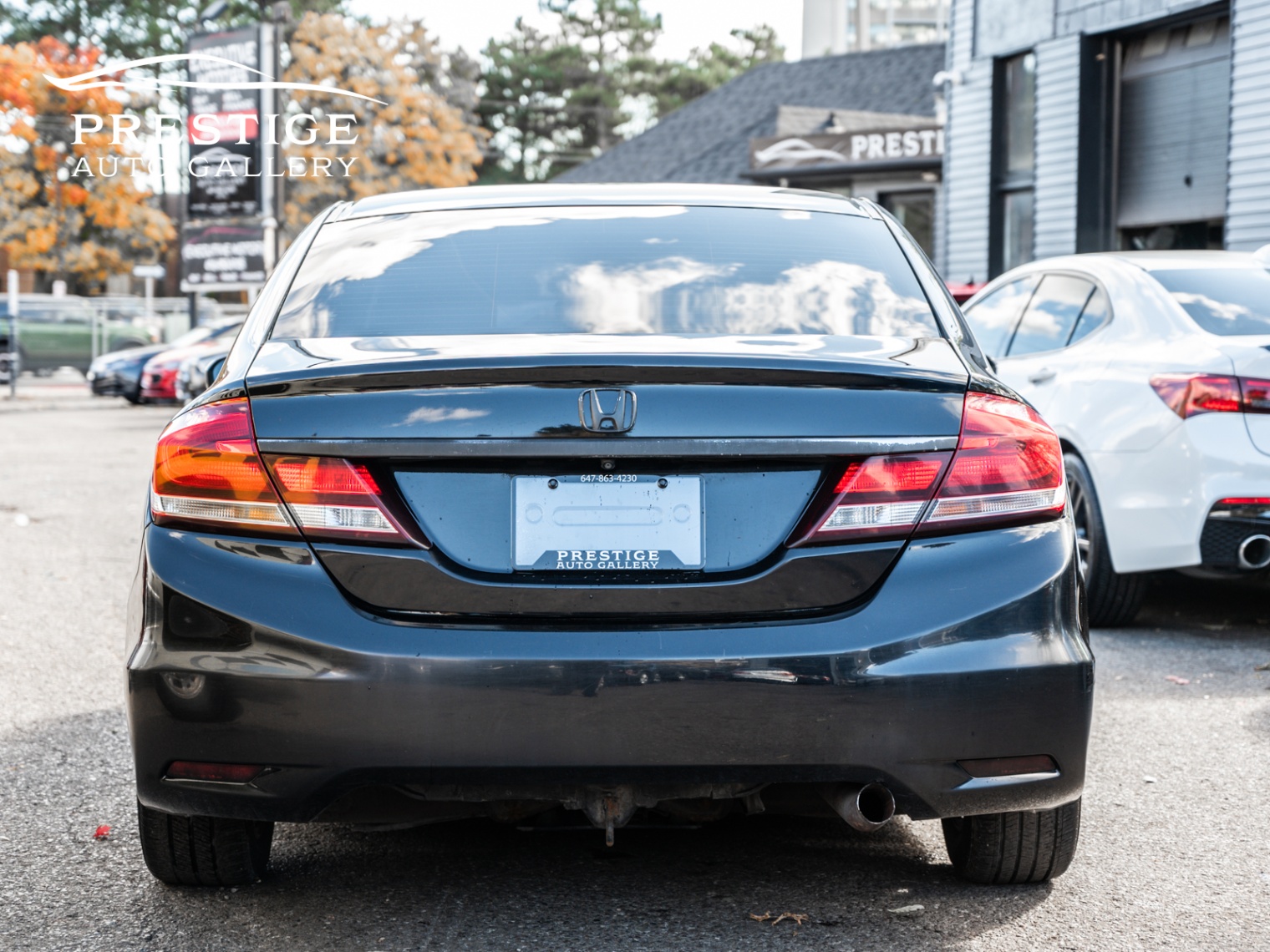 /prestigeautogallery/2014-Honda-CivicSedan-1533107829570246.jpg
