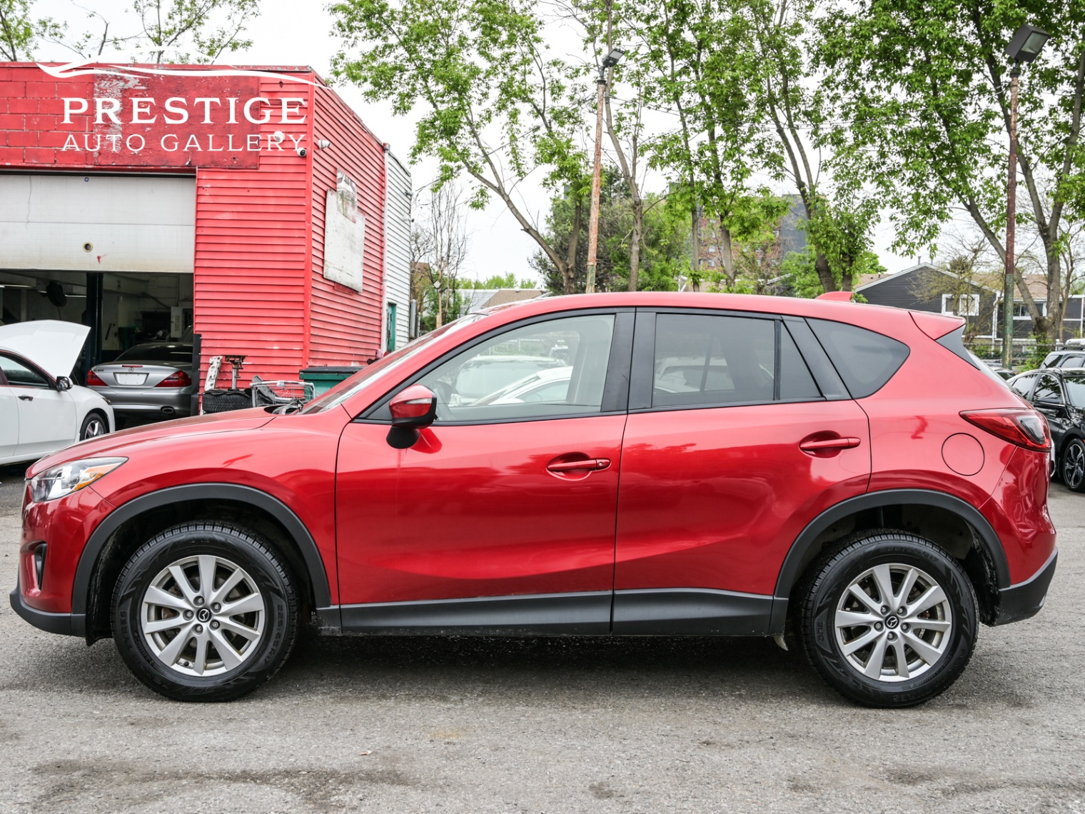 /prestigeautogallery/2015-Mazda-CX-5-008705341659487331.jpg