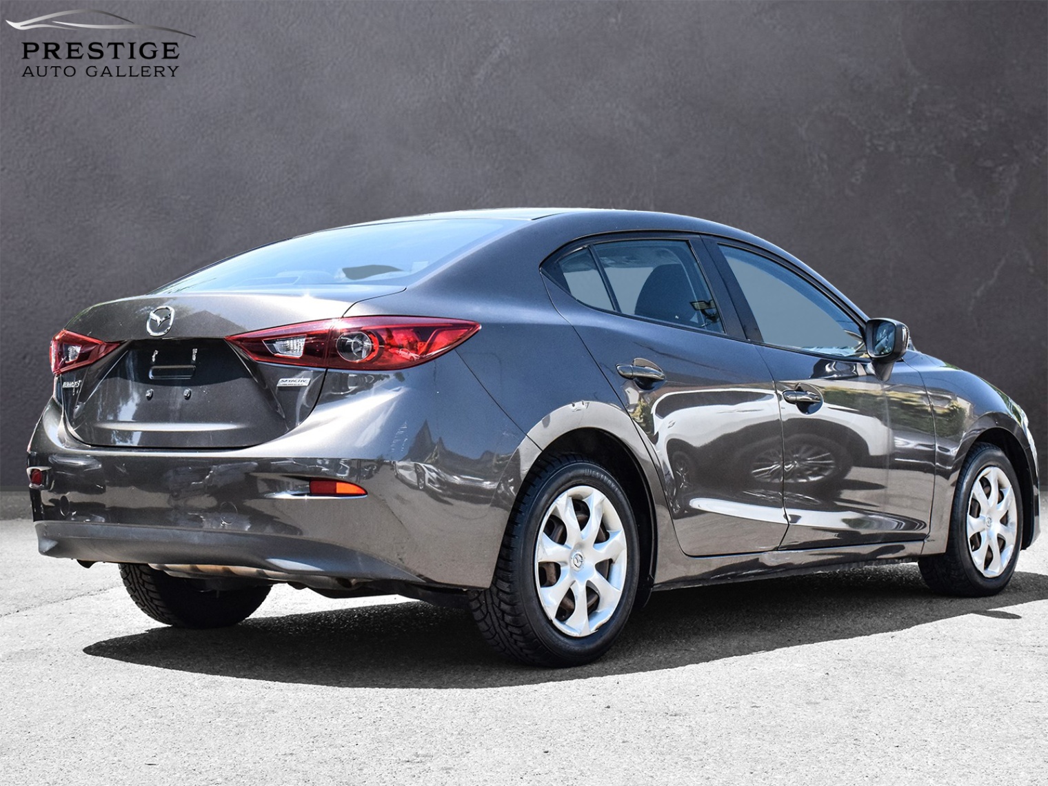 /prestigeautogallery/2015-Mazda-Mazda3-12458990066755948.jpg