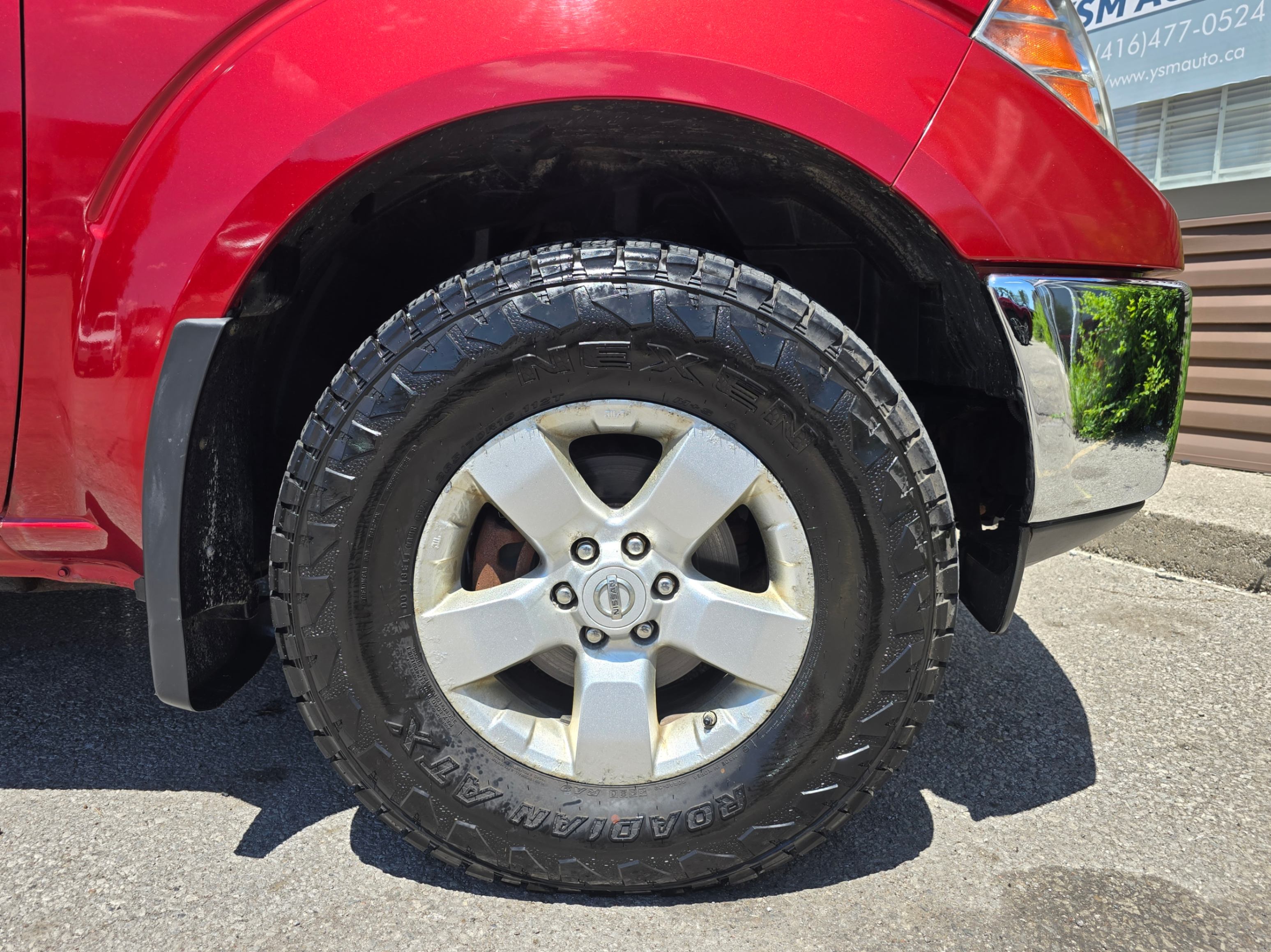 /rahmanmotors/2012-Nissan-Frontier-6158255298153286.jpg