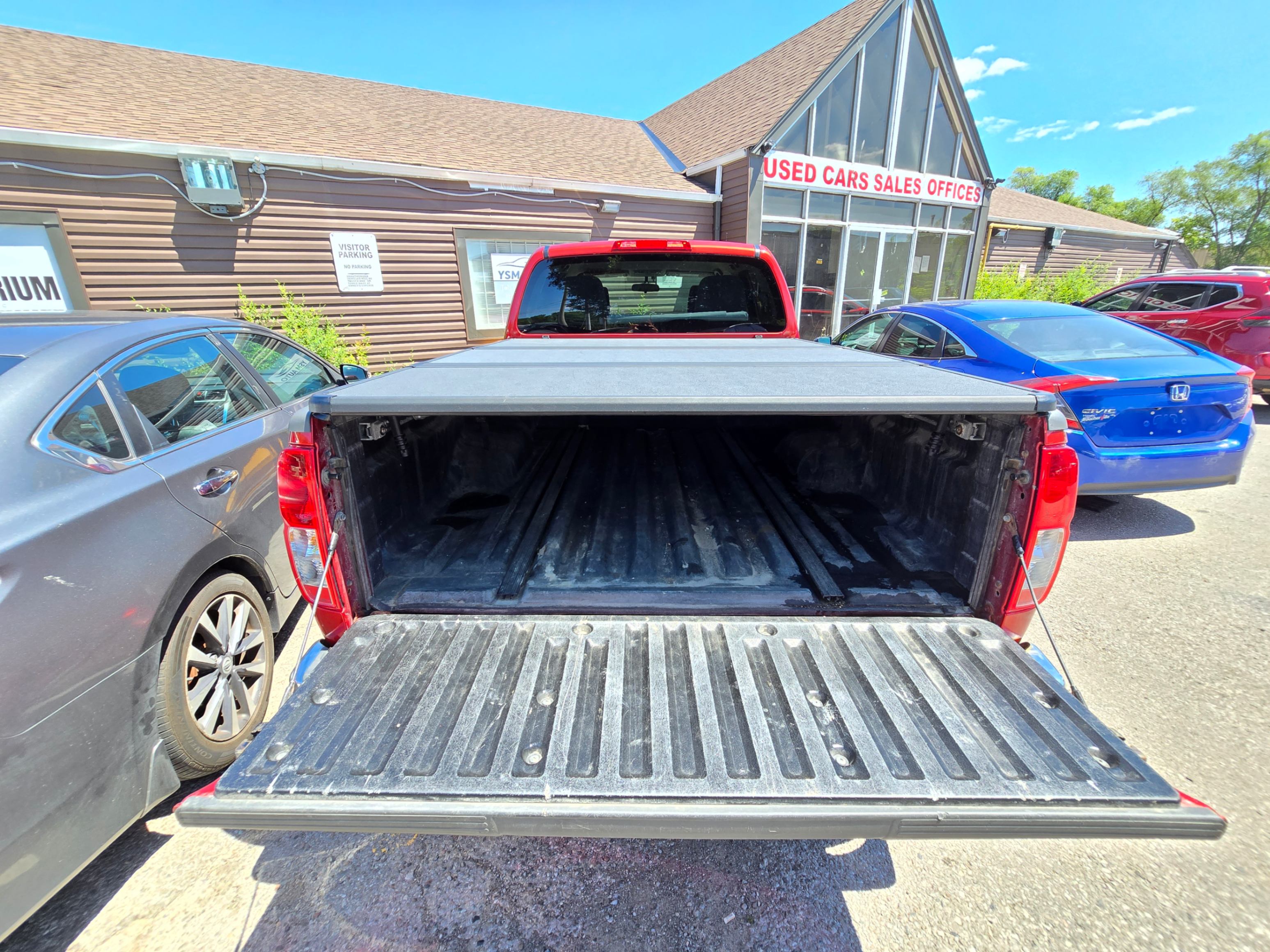 /rahmanmotors/2012-Nissan-Frontier-6579239472706466.jpg