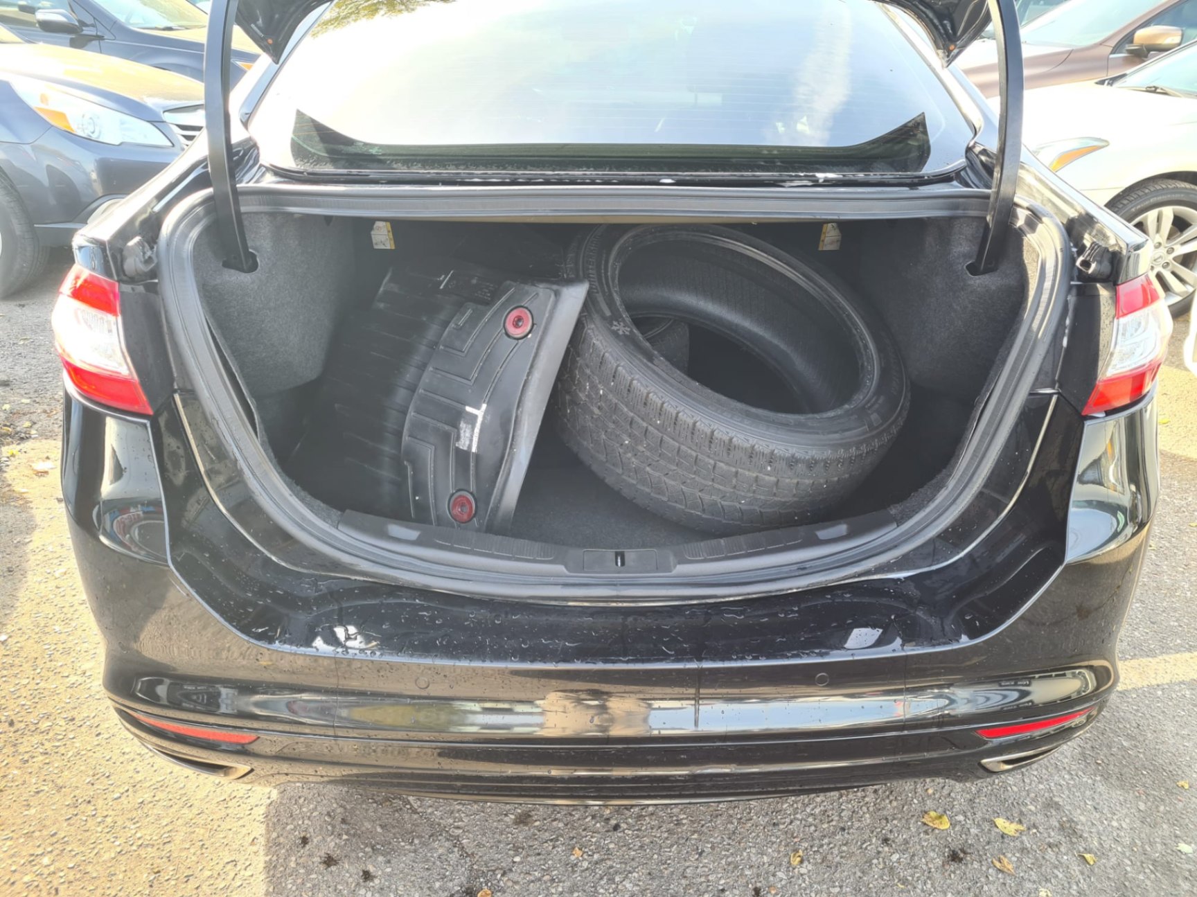 /rahmanmotors/2014-Ford-Fusion-40986338759587726.jpg