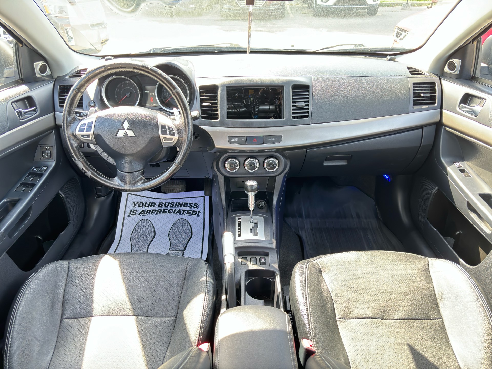 /rahmanmotors/2014-Mitsubishi-Lancer-25746739468195834.jpg