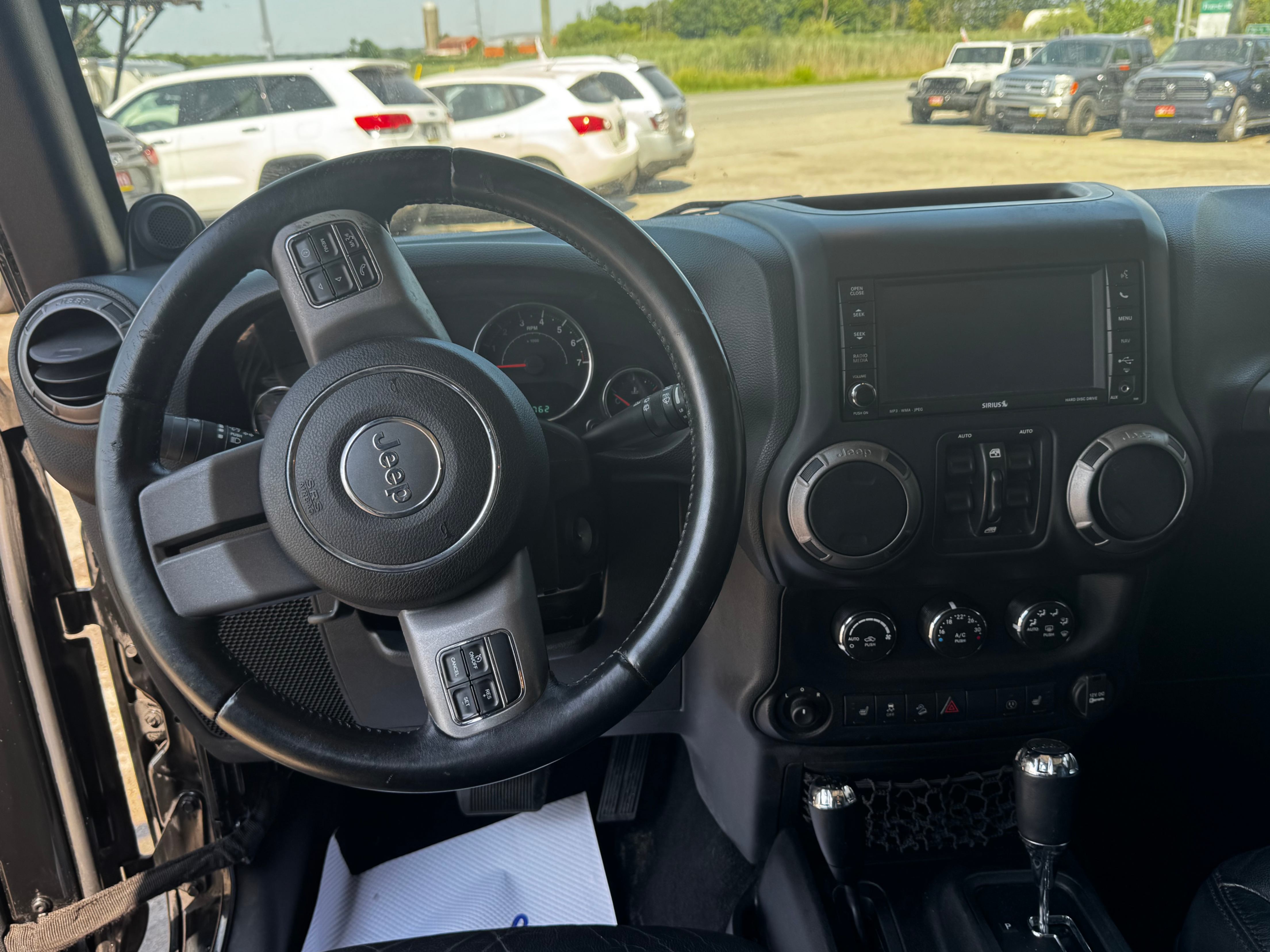 /stouffvilleautosales/2013-Jeep-WranglerUnlimited-980847352809735.jpg